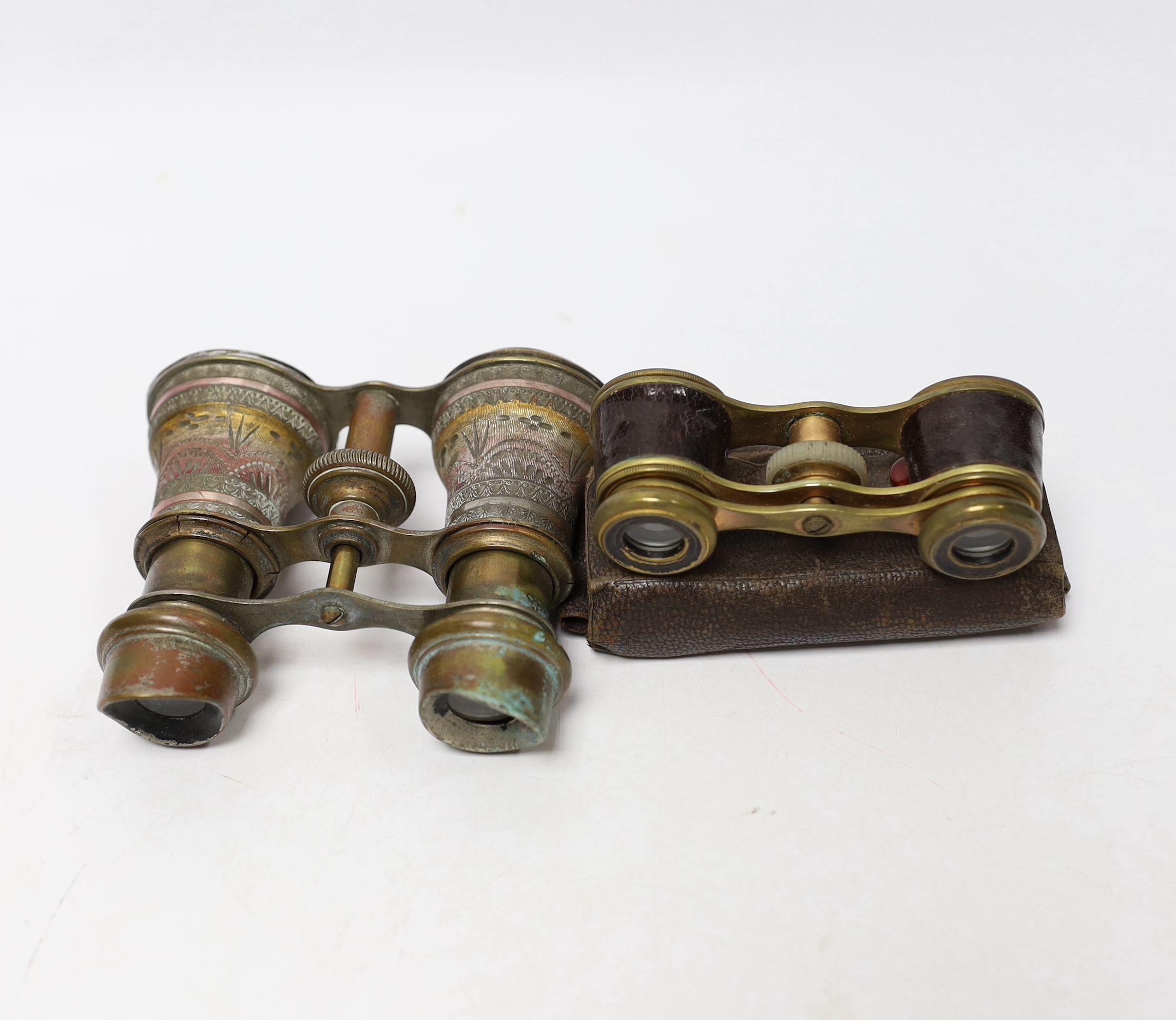 A Stereoscope viewer, a Verascope holder and two pairs of opera glasses